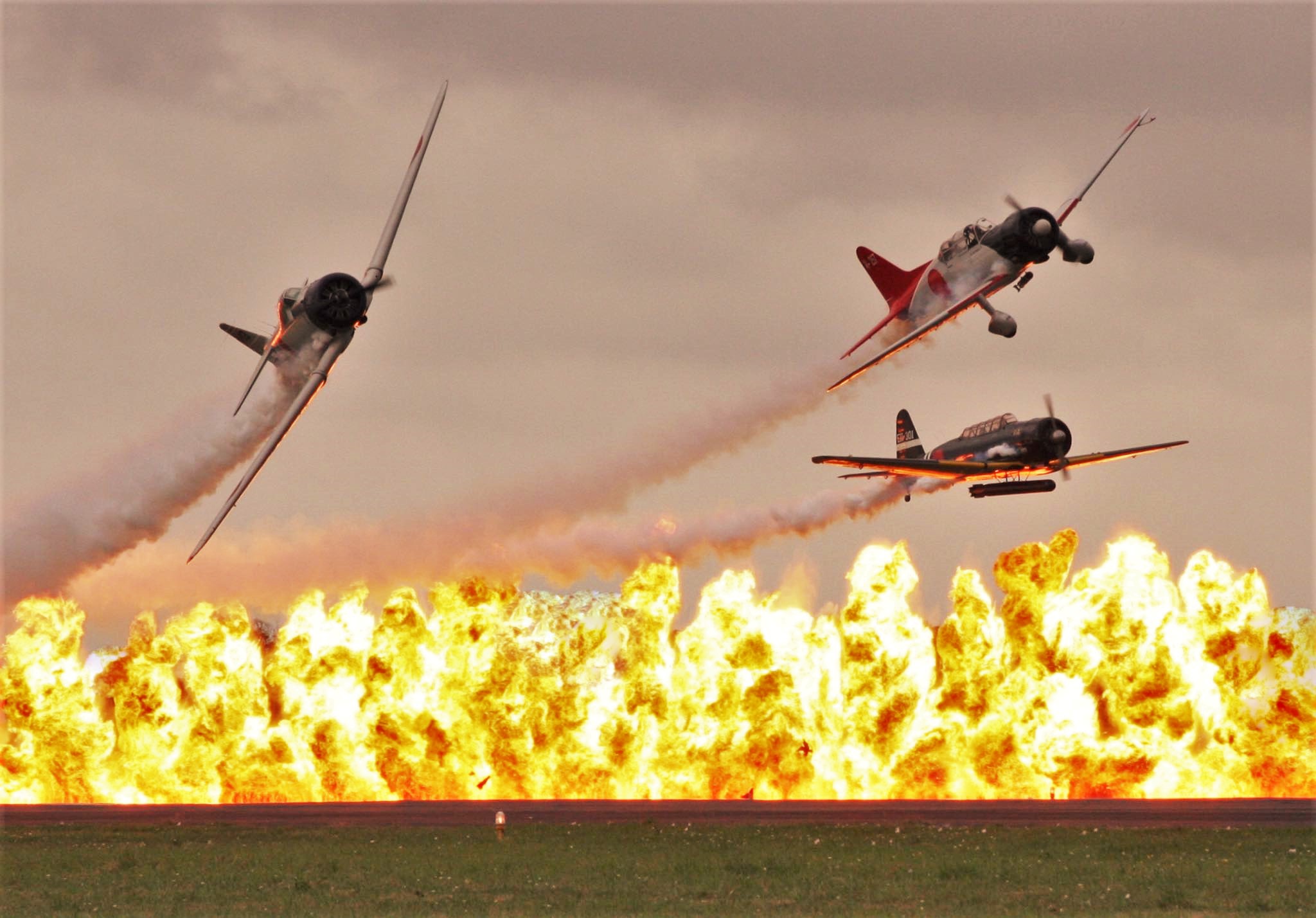 TORA Aircraft Over a Wall of Flames